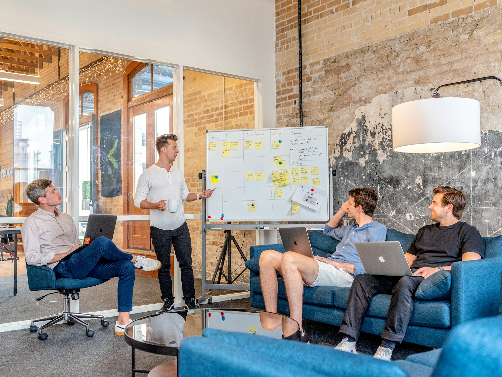 Marketing team reviewing an agency proposal in a meeting room
